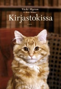 Kirjastokissa-kirjan kansi, jossa on ruskea-valkoinen kissa.